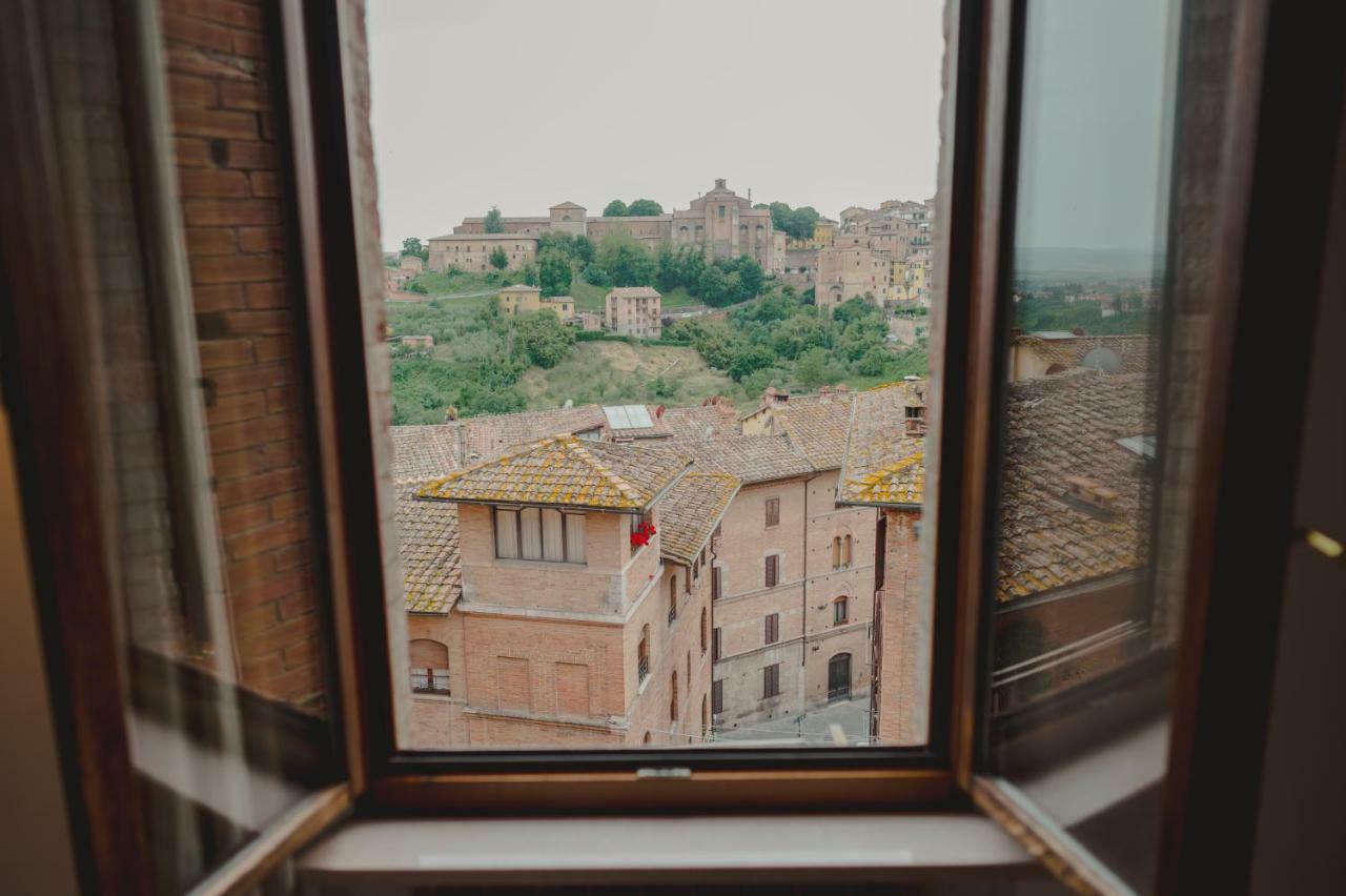 דירות סיינה Monolocale Panoramico San Martino 12 מראה חיצוני תמונה